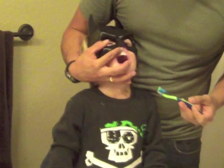 How A Dentist Brushes His Toddler'S Teeth - Batman.